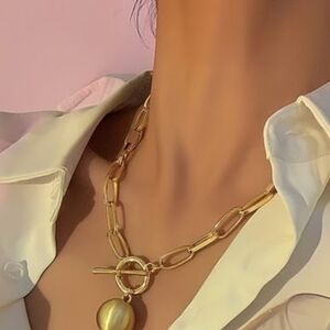 Gold plated necklace set with pendant and earrings